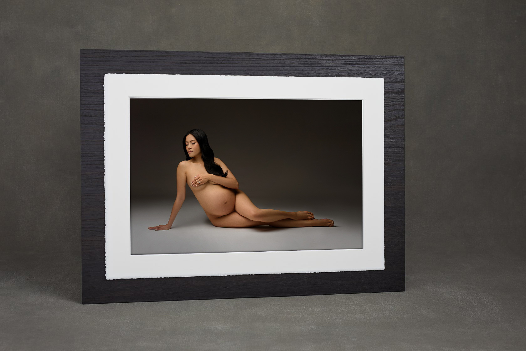 Sample photo of a Maternity portrait product, a matted print mounted to a wood backing, luxurious and high quality.